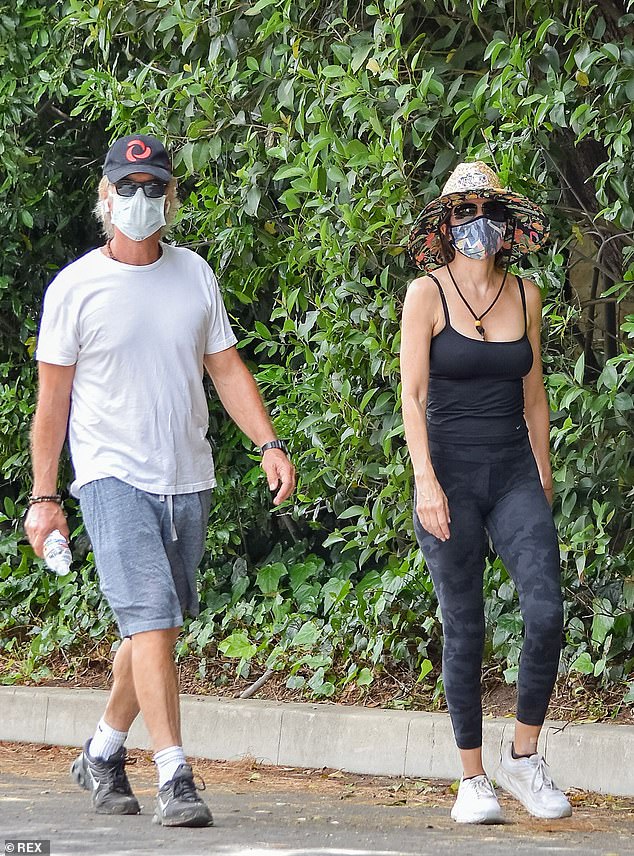 Lisa Rinna and husband Harry Hamlin enjoy a breath of fresh air