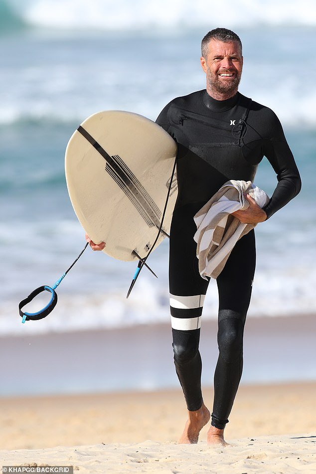 Pete Evans enjoys a surf at a Sydney beach after fans turned on him for ...