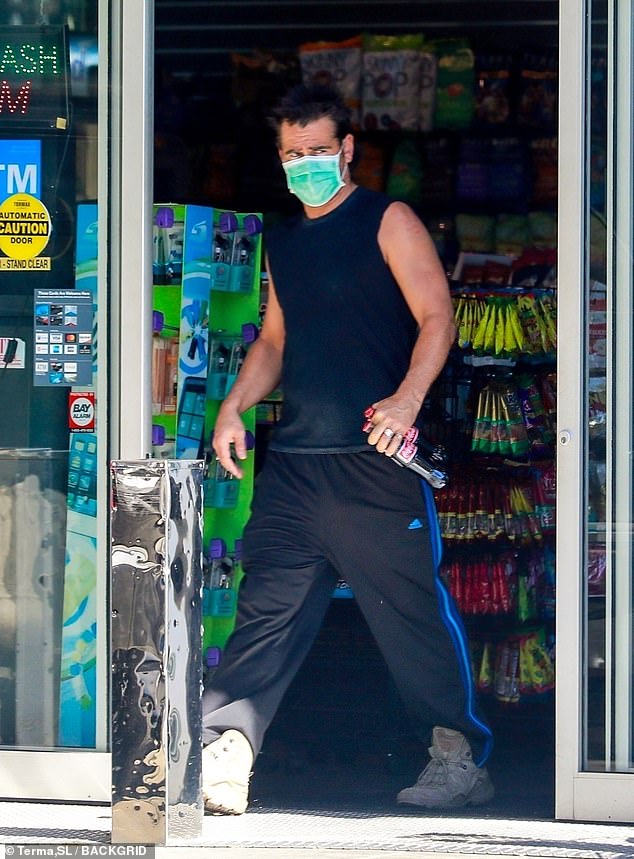 Colin Farrell flaunts ripped physique in tank top and track pants while ...