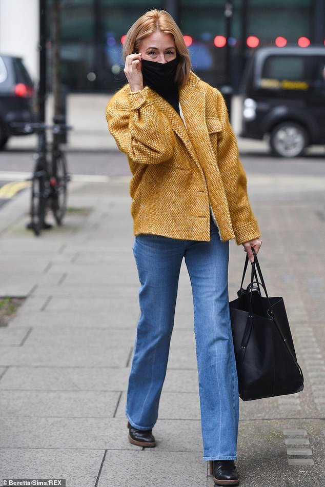 Cat Deeley exudes style in a mustard boucle jacket and flared denim ...