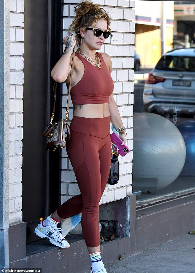 Rita Ora Flaunts Her Figure In A Crop Top And Leggings As She Leaves